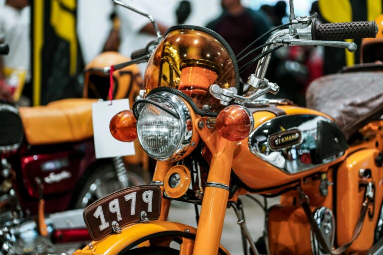 Detailed view of a classic 1979 Yamaha motorcycle at an exhibition.